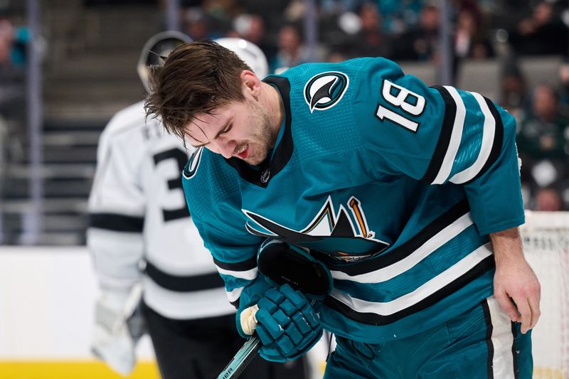 Apr 4, 2024; San Jose, California, USA; San Jose Sharks right wing Filip Zadina (18) bleeds from the mouth after a high sticking call against the Los Angeles Kings during the second period at SAP Center at San Jose. Mandatory Credit: Robert Edwards-USA TODAY Sports