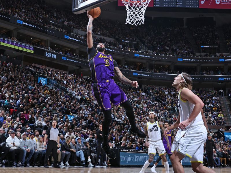 SALT LAKE CITY, UT - JANUARY 13: Anthony Davis #3 of the Los Angeles Lakers drives to the basket during the game against the Utah Jazz on January 13, 2024 at vivint.SmartHome Arena in Salt Lake City, Utah. NOTE TO USER: User expressly acknowledges and agrees that, by downloading and or using this Photograph, User is consenting to the terms and conditions of the Getty Images License Agreement. Mandatory Copyright Notice: Copyright 2024 NBAE (Photo by Melissa Majchrzak/NBAE via Getty Images)