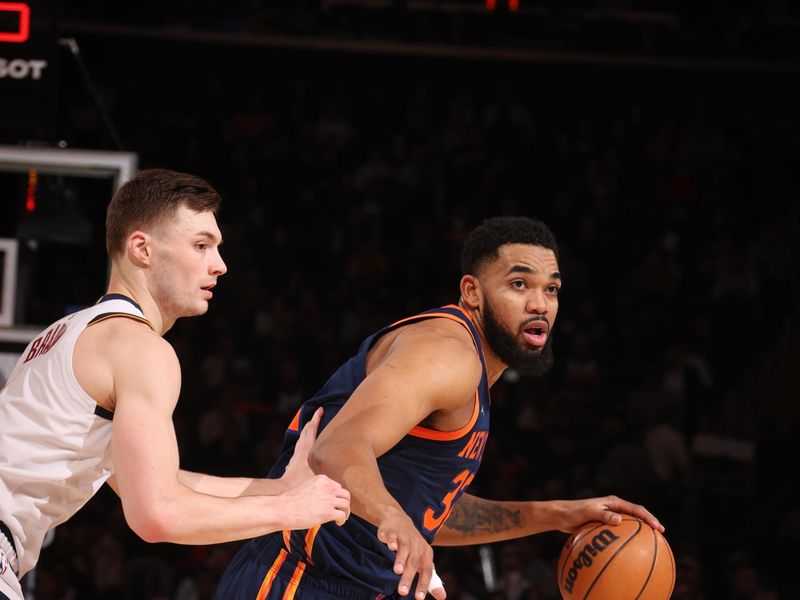 NEW YORK, NY - JANUARY 29:  Karl-Anthony Towns #32 of the New York Knicks handles the ball during the game against the Denver Nuggets on January 29, 2025 at Madison Square Garden in New York City, New York.  NOTE TO USER: User expressly acknowledges and agrees that, by downloading and or using this photograph, User is consenting to the terms and conditions of the Getty Images License Agreement. Mandatory Copyright Notice: Copyright 2025 NBAE  (Photo by Nathaniel S. Butler/NBAE via Getty Images)