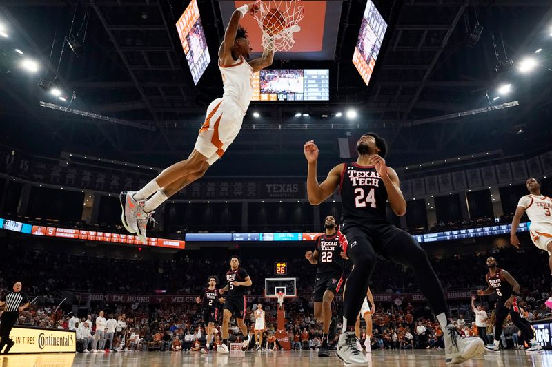 Jan 6, 2024; Austin, Texas, USA; Texas Longhorns forward Dillon Mitchell (23) dunks over Texas Tech Red Raiders during the second half at Moody Center. Mandatory Credit: Scott Wachter-USA TODAY Sports