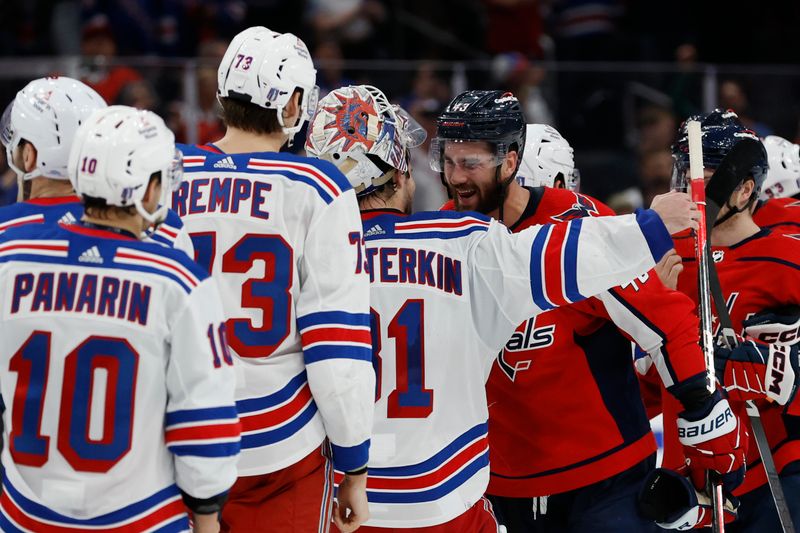 Apr 28, 2024; Washington, District of Columbia, USA; New York Rangers goaltender Igor Shesterkin (31) hugs Washington Capitals right wing Tom Wilson (43) in the handshake line after game four of the first round of the 2024 Stanley Cup Playoffs at Capital One Arena. Mandatory Credit: Geoff Burke-USA TODAY Sports