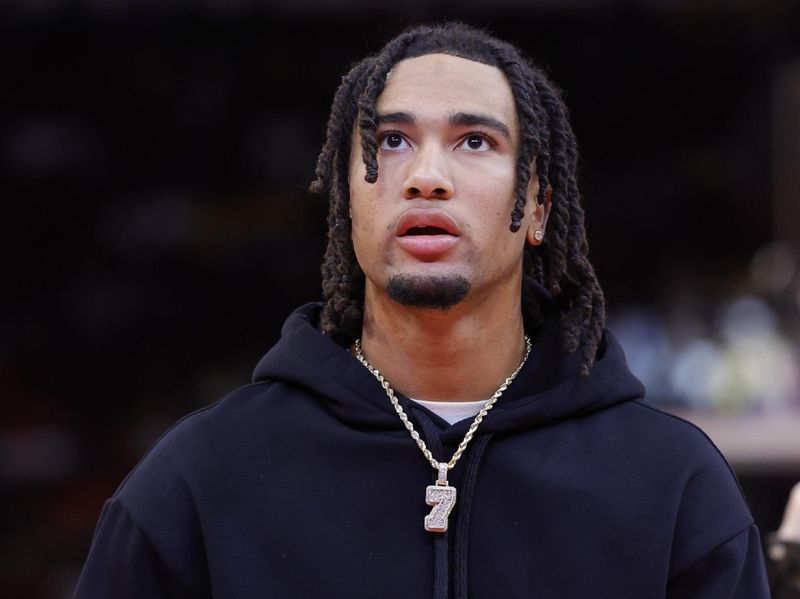 HOUSTON, TEXAS - NOVEMBER 08: CJ Stroud shoots the first basket prior to a game between the Houston Rockets and the Los Angeles Lakers at Toyota Center on November 08, 2023 in Houston, Texas. NOTE TO USER: User expressly acknowledges and agrees that, by downloading and or using this photograph, User is consenting to the terms and conditions of the Getty Images License Agreement.? (Photo by Carmen Mandato/Getty Images)