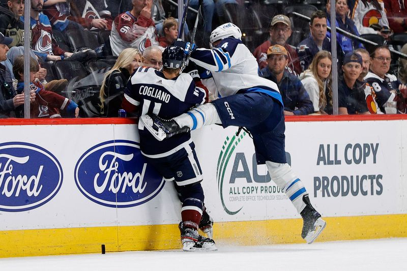 Apr 13, 2024; Denver, Colorado, USA; Winnipeg Jets defenseman Neal Pionk (4) and Colorado Avalanche center Andrew Cogliano (11) get tied up in the third period at Ball Arena. Mandatory Credit: Isaiah J. Downing-USA TODAY Sports