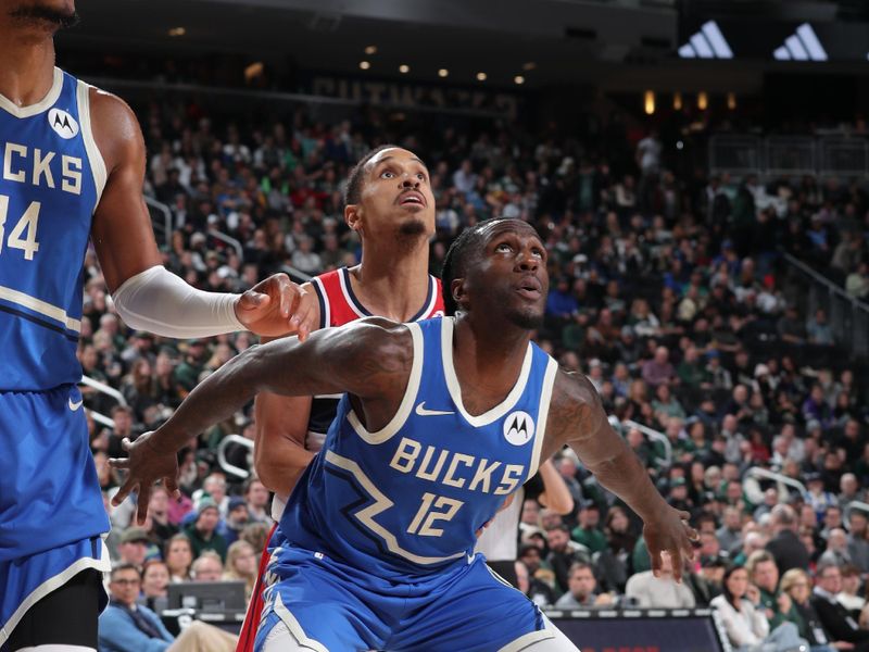 MILWAUKEE, WI - NOVEMBER 30: Taurean Prince #12 of the Milwaukee Bucks looks on during the game against the Washington Wizards on November 30, 2024 at Fiserv Forum Center in Milwaukee, Wisconsin. NOTE TO USER: User expressly acknowledges and agrees that, by downloading and or using this Photograph, user is consenting to the terms and conditions of the Getty Images License Agreement. Mandatory Copyright Notice: Copyright 2024 NBAE (Photo by Gary Dineen/NBAE via Getty Images).