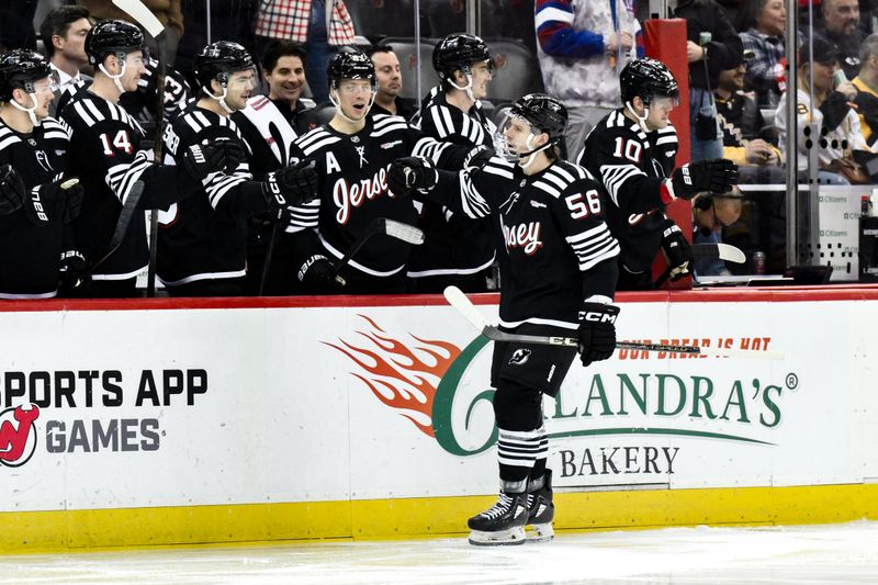 Apr 11, 2025; Newark, New Jersey, USA; New Jersey Devils left wing Erik Haula (56) celebrates with teammates after scoring a goal against the Pittsburgh Penguins during the first period at Prudential Center. Mandatory Credit: John Jones-Imagn Images