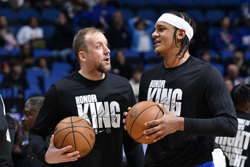 ORLANDO, FL - JANUARY 19: Joe Ingles #7 talks with Paolo Banchero #5 of the Orlando Magic before the game against the Philadelphia 76ers on January 19, 2024 at the Kia Center in Orlando, Florida. NOTE TO USER: User expressly acknowledges and agrees that, by downloading and or using this photograph, User is consenting to the terms and conditions of the Getty Images License Agreement. Mandatory Copyright Notice: Copyright 2024 NBAE (Photo by Fernando Medina/NBAE via Getty Images)