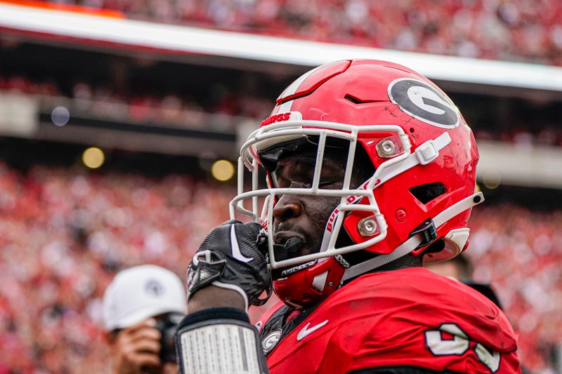 Sep 16, 2023; Athens, Georgia, USA; Georgia Bulldogs running back Daijun Edwards (30) reacts after scoring a touchdown against the South Carolina Gamecocks during the second half at Sanford Stadium. Mandatory Credit: Dale Zanine-USA TODAY Sports