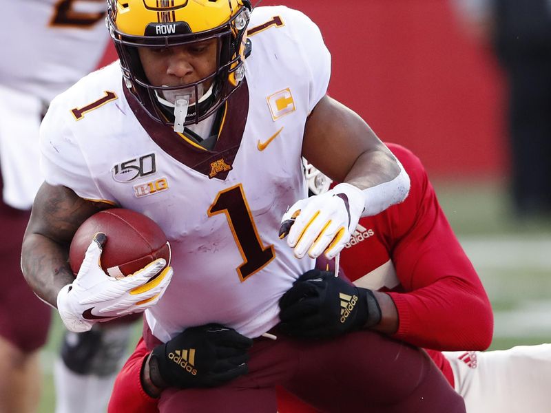 Oct 19, 2019; Piscataway, NJ, USA; Minnesota Golden Gophers running back Rodney Smith (1) rushes for a touchdown against the Rutgers Scarlet Knights during the second half at SHI Stadium. Mandatory Credit: Noah K. Murray-USA TODAY Sports