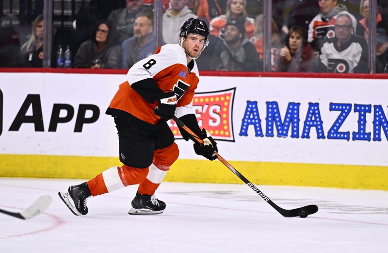 Jan 6, 2024; Philadelphia, Pennsylvania, USA; Philadelphia Flyers defenseman Cam York (8) controls the puck against the Calgary Flames in the third period at Wells Fargo Center. Mandatory Credit: Kyle Ross-USA TODAY Sports