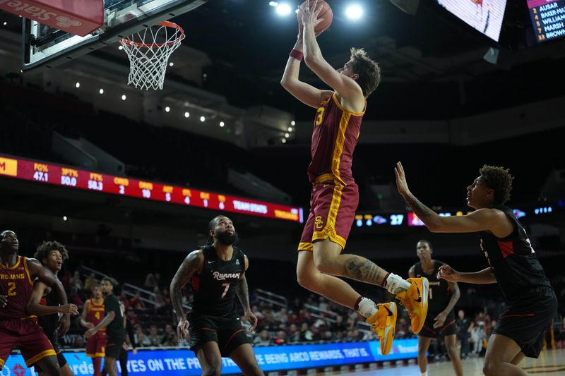 Dec 17, 2025; Los Angeles, California, USA; Southern California Trojans forward Jaden Brownell (33) shoots the ball against the UTSA Roadrunners in the first half at Galen Center. Mandatory Credit: Kirby Lee-Imagn Images