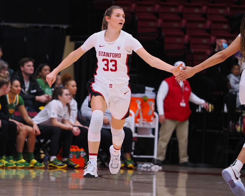 Jan 29, 2023; Stanford, California, USA; Stanford Cardinal guard Hannah Jump (33) high fives a teammate after scoring a basket against the Oregon Ducks during the first quarter at Maples Pavilion. Mandatory Credit: Kelley L Cox-USA TODAY Sports