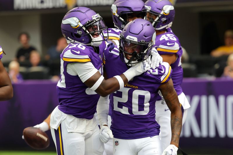 Minnesota Vikings safety Jay Ward (20) celebrates his sack and fumble recovery against the Arizona Cardinals during the first half of an NFL preseason football game, Saturday, Aug. 26, 2023, in Minneapolis. (AP Photo/Bruce Kluckhohn)