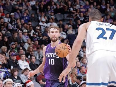 SACRAMENTO, CA - DECEMBER 23: Domantas Sabonis #10 of the Sacramento Kings drives to the basket during the game against the Minnesota Timberwolves on December 23, 2023 at Golden 1 Center in Sacramento, California. NOTE TO USER: User expressly acknowledges and agrees that, by downloading and or using this Photograph, user is consenting to the terms and conditions of the Getty Images License Agreement. Mandatory Copyright Notice: Copyright 2023 NBAE (Photo by Rocky Widner/NBAE via Getty Images)