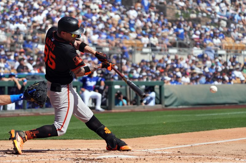 Mar 1, 2025; Phoenix, Arizona, USA; San Francisco Giants shortstop Christian Koss (85) bats against the Los Angeles Dodgers during the third inning at Camelback Ranch-Glendale. Mandatory Credit: Joe Camporeale-Imagn Images