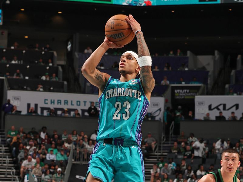 CHARLOTTE, NC - APRIL 1: Tre Mann #23 of the Charlotte Hornets shoots the ball during the game against the Boston Celtics on April 1, 2024 at Spectrum Center in Charlotte, North Carolina. NOTE TO USER: User expressly acknowledges and agrees that, by downloading and or using this photograph, User is consenting to the terms and conditions of the Getty Images License Agreement. Mandatory Copyright Notice: Copyright 2024 NBAE (Photo by Kent Smith/NBAE via Getty Images)