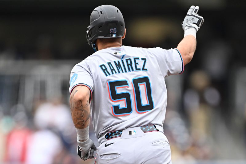 May 28, 2025; San Diego, California, USA; Miami Marlins catcher Agustin Ramirez (50) rounds the bases after hitting a solo home run during the third inning against the San Diego Padres at Petco Park. Mandatory Credit: Denis Poroy-Imagn Images
