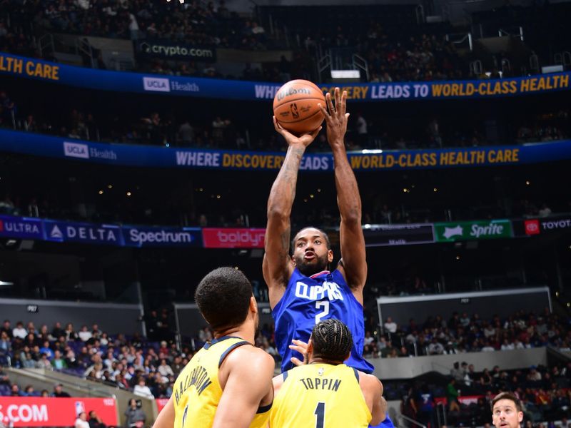 LOS ANGELES, CA - MARCH 25: Kawhi Leonard #2 of the LA Clippers shoots the ball during the game against the Indiana Pacers on March 25, 2024 at Crypto.Com Arena in Los Angeles, California. NOTE TO USER: User expressly acknowledges and agrees that, by downloading and/or using this Photograph, user is consenting to the terms and conditions of the Getty Images License Agreement. Mandatory Copyright Notice: Copyright 2024 NBAE (Photo by Adam Pantozzi/NBAE via Getty Images)