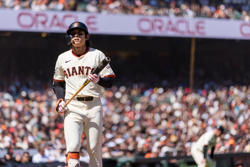 Apr 28, 2024; San Francisco, California, USA;  San Francisco Giants center fielder Jung Hoo Lee (51) reacts after taking a strike with runners in scoring position during the seventh inning of the game against the Pittsburgh Pirates at Oracle Park. Mandatory Credit: John Hefti-USA TODAY Sports