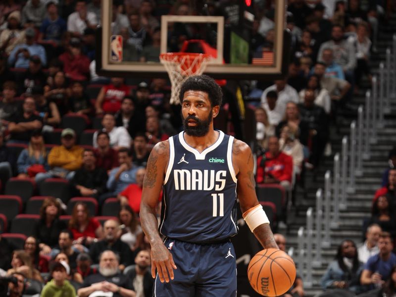 MIAMI, FL - NOVEMBER 24: Kyrie Irving #11 of the Dallas Mavericks dribbles the ball during the game against the Miami Heat on November 24, 2024 at Kaseya Center in Miami, Florida. NOTE TO USER: User expressly acknowledges and agrees that, by downloading and or using this Photograph, user is consenting to the terms and conditions of the Getty Images License Agreement. Mandatory Copyright Notice: Copyright 2024 NBAE (Photo by Issac Baldizon/NBAE via Getty Images)