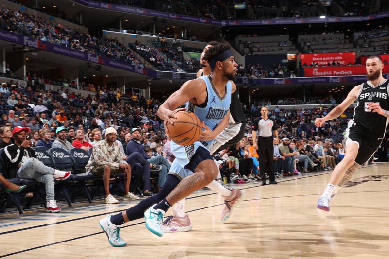 MEMPHIS, TN - APRIL 9: Jordan Goodwin #4 of the Memphis Grizzlies dribbles the ball during the game against the San Antonio Spurs on April 9, 2024 at FedExForum in Memphis, Tennessee. NOTE TO USER: User expressly acknowledges and agrees that, by downloading and or using this photograph, User is consenting to the terms and conditions of the Getty Images License Agreement. Mandatory Copyright Notice: Copyright 2024 NBAE (Photo by Joe Murphy/NBAE via Getty Images)