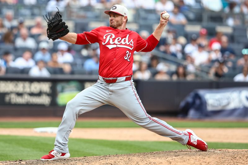Jul 4, 2024; Bronx, New York, USA; Cincinnati Reds relief pitcher Justin Wilson (32) pitches in the eighth inning against the New York Yankees at Yankee Stadium. Mandatory Credit: Wendell Cruz-USA TODAY Sports