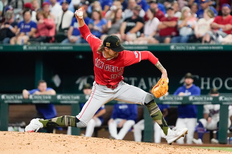 May 18, 2024; Arlington, Texas, USA; Los Angeles Angels relief pitcher Adam Cimber (90) throws to the plate during the seventh inning against the Texas Rangers at Globe Life Field. Mandatory Credit: Raymond Carlin III-USA TODAY Sports