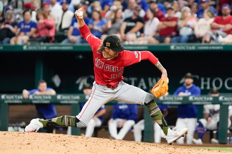 May 18, 2024; Arlington, Texas, USA; Los Angeles Angels relief pitcher Adam Cimber (90) throws to the plate during the seventh inning against the Texas Rangers at Globe Life Field. Mandatory Credit: Raymond Carlin III-USA TODAY Sports