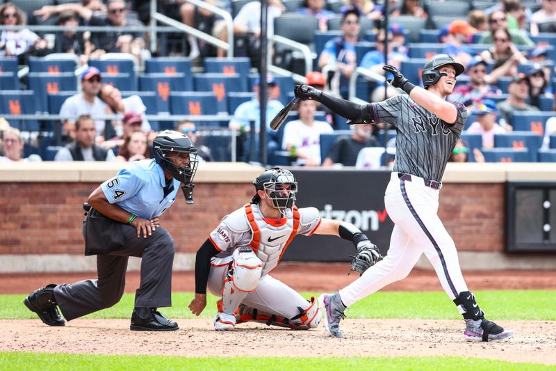 May 25, 2024; New York City, New York, USA;  New York Mets third baseman Brett Baty (22) hits a solo home run in the seventh inning against the San Francisco Giants at Citi Field. Mandatory Credit: Wendell Cruz-USA TODAY Sports