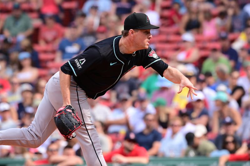 Aug 25, 2024; Boston, Massachusetts, USA; Arizona Diamondbacks pitcher Joe Mantiply (35) pitches against the Boston Red Sox during the seventh inning at Fenway Park. Mandatory Credit: Eric Canha-USA TODAY Sports