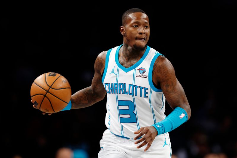 NEW YORK, NEW YORK - NOVEMBER 30: Terry Rozier #3 of the Charlotte Hornets dribbles during the first half against the Brooklyn Nets at Barclays Center on November 30, 2023 in the Brooklyn borough of New York City, New York. NOTE TO USER: User expressly acknowledges and agrees that, by downloading and/or using this Photograph, user is consenting to the terms and conditions of the Getty Images License Agreement. (Photo by Sarah Stier/Getty Images)