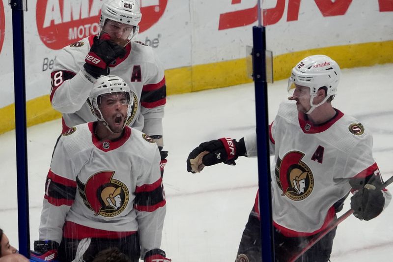 Feb 19, 2024; Tampa, Florida, USA; Ottawa Senators right wing Mathieu Joseph (21) celebrates after scoring a goal against the Tampa Bay Lightning during the first period at Amalie Arena. Mandatory Credit: Dave Nelson-USA TODAY Sports