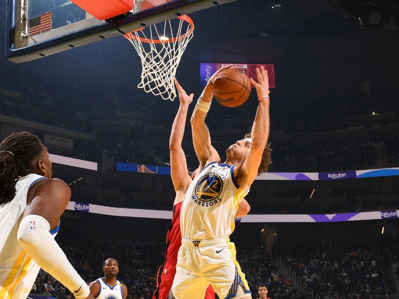 SAN FRANCISCO, CA - DECEMBER 5: Brandin Podziemski #2 of the Golden State Warriors drives to the basket during the game against the Houston Rockets on December 5, 2024 at Chase Center in San Francisco, California. NOTE TO USER: User expressly acknowledges and agrees that, by downloading and or using this photograph, user is consenting to the terms and conditions of Getty Images License Agreement. Mandatory Copyright Notice: Copyright 2024 NBAE (Photo by Noah Graham/NBAE via Getty Images)