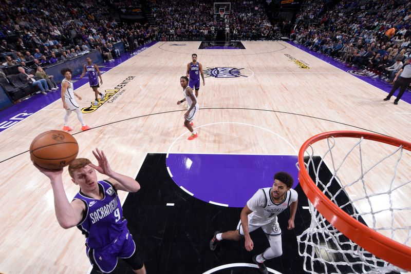 SACRAMENTO, CA - NOVEMBER 24: Kevin Huerter #9 of the Sacramento Kings shoots the ball during the game against the Brooklyn Nets on November 24, 2024 at Golden 1 Center in Sacramento, California. NOTE TO USER: User expressly acknowledges and agrees that, by downloading and or using this Photograph, user is consenting to the terms and conditions of the Getty Images License Agreement. Mandatory Copyright Notice: Copyright 2024 NBAE (Photo by Rocky Widner/NBAE via Getty Images)