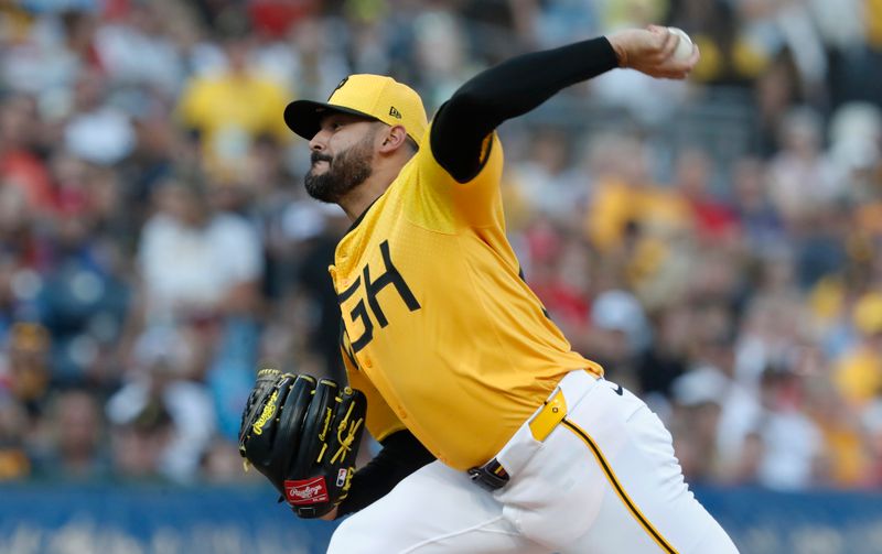 Jul 19, 2024; Pittsburgh, Pennsylvania, USA;  Pittsburgh Pirates starting pitcher Martín Pérez (54) delivers a pitch against the Philadelphia Phillies during the first inning at PNC Park. Mandatory Credit: Charles LeClaire-USA TODAY Sports