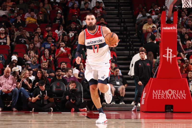 HOUSTON, TX - NOVEMBER 11: Jonas Valanciunas #17 of the Washington Wizards dribbles the ball during the game against the Houston Rockets on November 11, 2024 at the Toyota Center in Houston, Texas. NOTE TO USER: User expressly acknowledges and agrees that, by downloading and or using this photograph, User is consenting to the terms and conditions of the Getty Images License Agreement. Mandatory Copyright Notice: Copyright 2024 NBAE (Photo by KeShawn Ennis/NBAE via Getty Images)