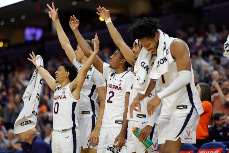 Nov 25, 2022; Charlottesville, Virginia, USA; Virginia Cavaliers players celebrate on the bench in the final minutes against the Maryland-Eastern Shore Hawks in the second half at John Paul Jones Arena. Mandatory Credit: Geoff Burke-USA TODAY Sports