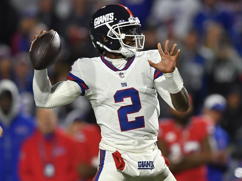 New York Giants quarterback Tyrod Taylor (2) throws a pass during the first half of an NFL football game against the Buffalo Bills in Orchard Park, N.Y., Sunday, Oct. 15, 2023. (AP Photo/Adrian Kraus)