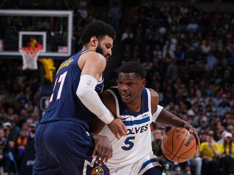 DENVER, CO - APRIL 10: Anthony Edwards #5 of the Minnesota Timberwolves dribbles the ball during the game against the Denver Nuggets on April 10, 2024 at the Ball Arena in Denver, Colorado. NOTE TO USER: User expressly acknowledges and agrees that, by downloading and/or using this Photograph, user is consenting to the terms and conditions of the Getty Images License Agreement. Mandatory Copyright Notice: Copyright 2024 NBAE (Photo by Garrett Ellwood/NBAE via Getty Images)