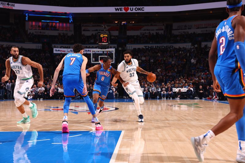 OKLAHOMA CITY, OK - JANUARY 29: Karl-Anthony Towns #32 of the Minnesota Timberwolves handles the ball during the game against the Oklahoma City Thunder on January 29, 2024 at Paycom Arena in Oklahoma City, Oklahoma. NOTE TO USER: User expressly acknowledges and agrees that, by downloading and or using this photograph, User is consenting to the terms and conditions of the Getty Images License Agreement. Mandatory Copyright Notice: Copyright 2024 NBAE (Photo by Zach Beeker/NBAE via Getty Images)