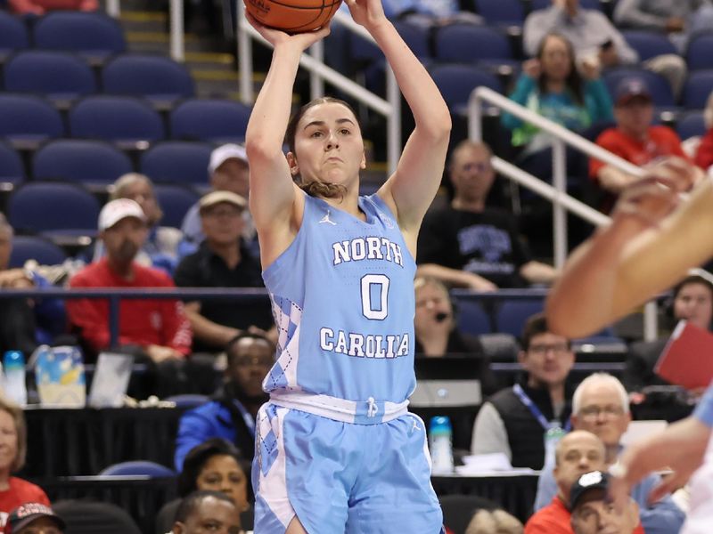 Mar 7, 2025; Greensboro, NC, USA;  North Carolina Tar Heels guard Lanie Grant (0) makes a 3 point shot against \Florida State Seminoles during the second quarter at First Horizon Coliseum. Mandatory Credit: Cory Knowlton-Imagn Images