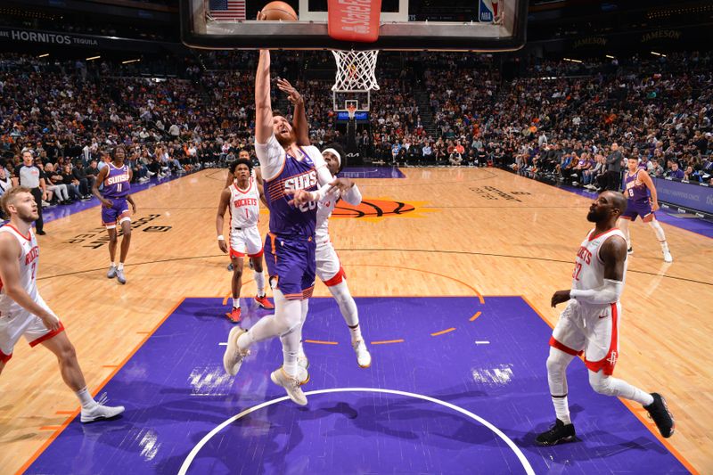 PHOENIX, AZ - MARCH 2: Jusuf Nurkic #20 of the Phoenix Suns shoots the ball during the game against the Houston Rockets on March 2, 2024 at Footprint Center in Phoenix, Arizona. NOTE TO USER: User expressly acknowledges and agrees that, by downloading and or using this photograph, user is consenting to the terms and conditions of the Getty Images License Agreement. Mandatory Copyright Notice: Copyright 2024 NBAE (Photo by Barry Gossage/NBAE via Getty Images)