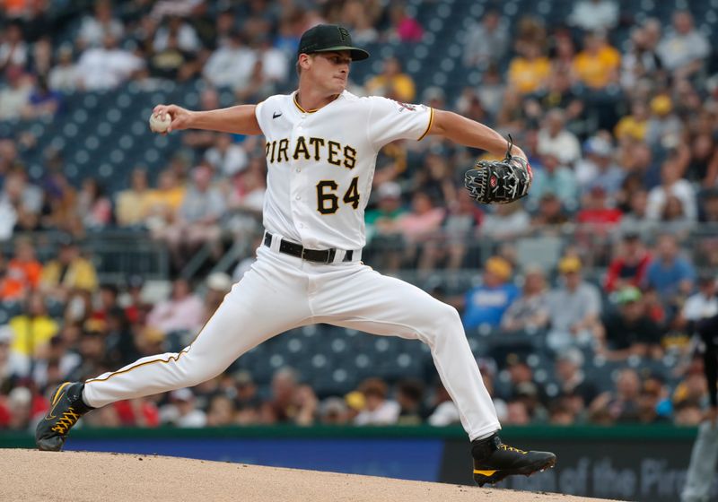 Jul 17, 2023; Pittsburgh, Pennsylvania, USA;  Pittsburgh Pirates starting pitcher Quinn Priester (64) delivers a pitch in his major league debut against the Cleveland Guardians during the first inning at PNC Park. Mandatory Credit: Charles LeClaire-USA TODAY Sports