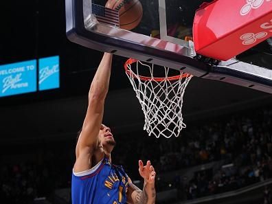 DENVER, CO - DECEMBER 16: Michael Porter Jr. #1 of the Denver Nuggets drives to the basket during the game against the Oklahoma City Thunder on December 16, 2023 at the Ball Arena in Denver, Colorado. NOTE TO USER: User expressly acknowledges and agrees that, by downloading and/or using this Photograph, user is consenting to the terms and conditions of the Getty Images License Agreement. Mandatory Copyright Notice: Copyright 2023 NBAE (Photo by Bart Young/NBAE via Getty Images)