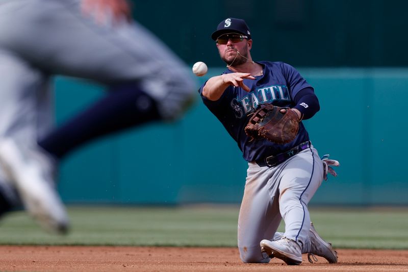 May 25, 2024; Washington, District of Columbia, USA; Seattle Mariners first baseman Ty France (23) makes a throw to first base after fielding a ground ball by Washington Nationals outfielder Jacob Young (not pictured) during the third inning at Nationals Park. Mandatory Credit: Geoff Burke-USA TODAY Sports