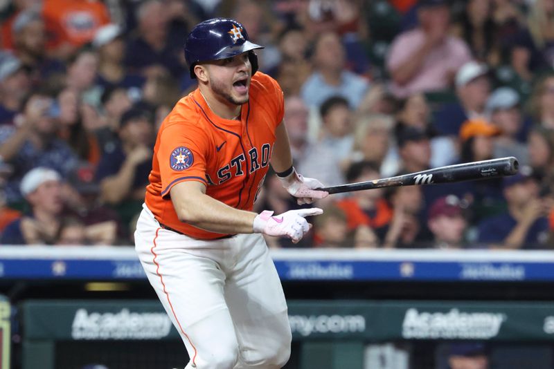 May 30, 2025; Houston, Texas, USA; Houston Astros catcher Yainer Diaz (21) reacts after hitting a walk-off home run during the ninth inning against the Tampa Bay Rays at Daikin Park. Mandatory Credit: Troy Taormina-Imagn Images