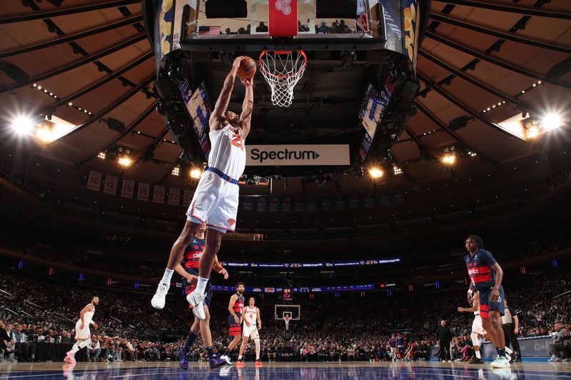 NEW YORK, NY - NOVEMBER 18:Jericho Sims #20 of the New York Knicks drives to the basket during the game against the Washington Wizards  on November 18, 2024 at Madison Square Garden in New York City, New York.  NOTE TO USER: User expressly acknowledges and agrees that, by downloading and or using this photograph, User is consenting to the terms and conditions of the Getty Images License Agreement. Mandatory Copyright Notice: Copyright 2024 NBAE  (Photo by Nathaniel S. Butler/NBAE via Getty Images)