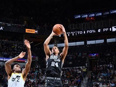 SAN ANTONIO, TX - DECEMBER 26: Devin Vassell #24 of the San Antonio Spurs shoots the ball during the game against the Utah Jazz on December 26, 2023 at the Frost Bank Center in San Antonio, Texas. NOTE TO USER: User expressly acknowledges and agrees that, by downloading and or using this photograph, user is consenting to the terms and conditions of the Getty Images License Agreement. Mandatory Copyright Notice: Copyright 2023 NBAE (Photos by Michael Gonzales/NBAE via Getty Images)