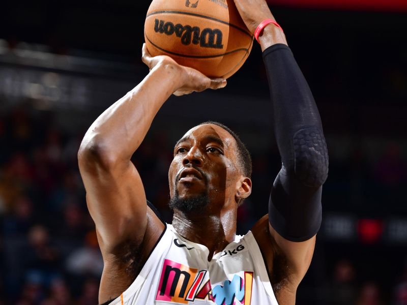 PHOENIX, AZ - JANUARY 6: Bam Adebayo #13 of the Miami Heat shoots the ball during the game against the Phoenix Suns on January 6, 2023 at Footprint Center in Phoenix, Arizona. NOTE TO USER: User expressly acknowledges and agrees that, by downloading and or using this photograph, user is consenting to the terms and conditions of the Getty Images License Agreement. Mandatory Copyright Notice: Copyright 2022 NBAE (Photo by Barry Gossage/NBAE via Getty Images)