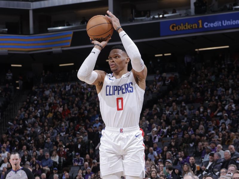 SACRAMENTO, CA - MARCH 3: Russell Westbrook #0 of the LA Clippers shoots a three point basket during the game against the Sacramento Kings on March 3, 2023 at Golden 1 Center in Sacramento, California. NOTE TO USER: User expressly acknowledges and agrees that, by downloading and or using this Photograph, user is consenting to the terms and conditions of the Getty Images License Agreement. Mandatory Copyright Notice: Copyright 2023 NBAE (Photo by Rocky Widner/NBAE via Getty Images)