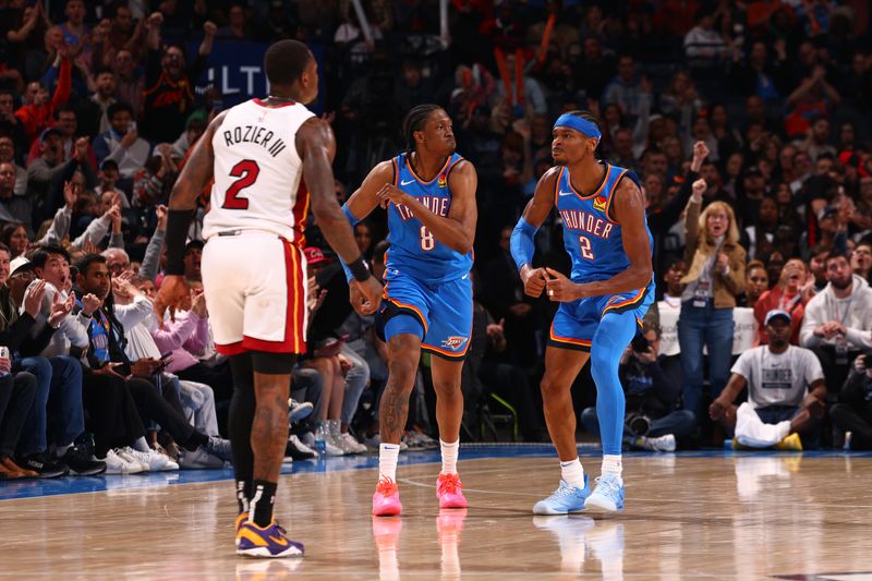 OKLAHOMA CITY, OK - MARCH 8:  Shai Gilgeous-Alexander #2 and Jalen Williams #8 of the Oklahoma City Thunder reacts during the game against the Miami Heat on March 8, 2024 at Paycom Arena in Oklahoma City, Oklahoma. NOTE TO USER: User expressly acknowledges and agrees that, by downloading and or using this photograph, User is consenting to the terms and conditions of the Getty Images License Agreement. Mandatory Copyright Notice: Copyright 2024 NBAE (Photo by Zach Beeker/NBAE via Getty Images)